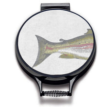 Load image into Gallery viewer, painted illustration of a salmon fish with green and pink colouring print on a beige linen circular aga cover with black hemming. fish tail of the aga chef's pad. Pictured on metal aga lid on an isolated background. Mustard and Gray Severn Salmon Circular Hob Cover