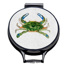 Load image into Gallery viewer, green crab watercolour painting on a beige linen circular aga cover with black hemming. Pictured on metal aga lid on an isolated background. Mustard and Gray