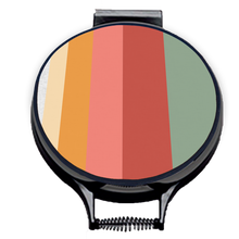 Load image into Gallery viewer, Stripes of green, red, pink and orange on beige linen circular aga cover with black hemming. Aga chef&#39;s pad hob cover. Pictured on metal aga lid on an isolated background. Mustard and Gray
