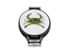 Load image into Gallery viewer, Green Crab watercolour painting on a beige linen circular aga cover with black hemming. Pictured on metal aga lid on an isolated background. Mustard and Gray
